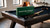 Sawyer Twain Kickoff Billiard Accessories Kit laid out on a pool table with maple cues, billiard balls, wood triangle rack and chalk