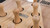 Plank & Hide Co Plank & Hide Shuffleboard Bowling Pin Set, wooden bowling pins stored in a wooden rack.
