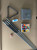 Sawyer Twain X-Air 8' Outdoor Slate Pool Table, disassembled parts including pool cue sticks, triangle, pool balls, cloth, and accessories for outdoor use.