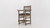 Plank & Hide Co Spectator Chair, wooden chair with armrests and black cushioned seat on a plain white background.