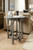 Hooker Furniture Sabi Sands Sling Chair, rustic wooden side table next to beige sofa in cozy living room.