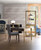 Hooker Furniture Curata Bunching Bookcase, modern gold and glass bookshelf with decorative items on shelves in a stylish home office setting.