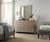 Hooker Furniture Affinity Host Chair - 2 per carton/price each, shown in a modern bedroom with a dresser and mirror, accented with decorative vases and artwork.