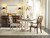 Hooker Furniture Leesburg Buffet, a traditional dark wood sideboard with decorative carved details, set against a light-colored wall with artwork and wall lamps.