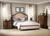 Hooker Furniture Leesburg King Upholstered Bed with Wood Rails, elegant bedroom with tufted upholstered headboard, side tables, and decorative accessories.