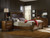 Hooker Furniture Tynecastle Dresser, a classic wooden bedroom dresser with a large mirror and multiple drawers in a rustic style.