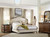 Hooker Furniture Archivist Bachelors Chest, elegant bedroom interior with wooden dresser, upholstered bed, and cozy decor.