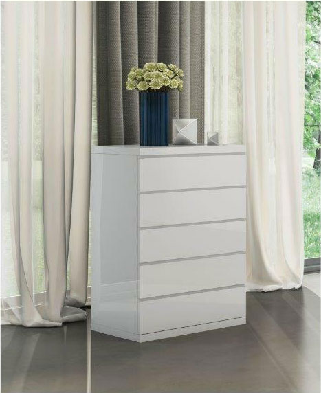 white chest of drawers against curtains