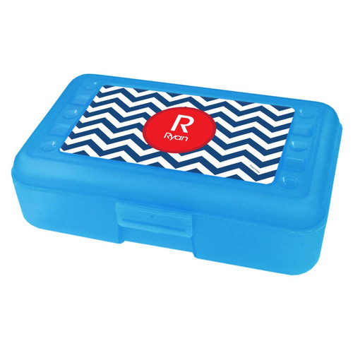 Spark & Spark Chevron Navy And Red Pencil Box, blue plastic pencil case with a chevron pattern and a red circular label with a white 'R' and the name 'Ryan'.
