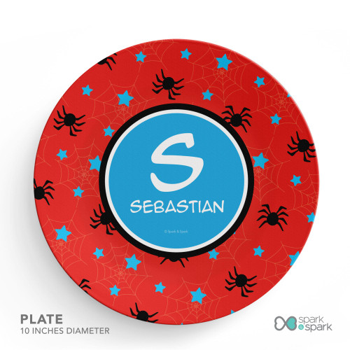 Spark & Spark Fun Spider Web Kids Placemats, round red placemat with black spiders, blue stars, and spider web designs, personalized with the name Sebastian in the center.