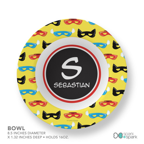 Spark & Spark Super Hero Masks Kids Placemats, colorful round placemat featuring superhero mask illustrations on a yellow background with a customizable name space in the center.