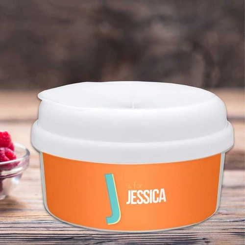 Spark & Spark Double Initial Orange Snack Bowl, personalized with the initial J and the name Jessica on the side.