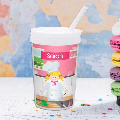 Spark & Spark A Girl Chef's Taste Toddler Cup, pink and white themed children's cup with a girl chef illustration and the name Sarah on it.
