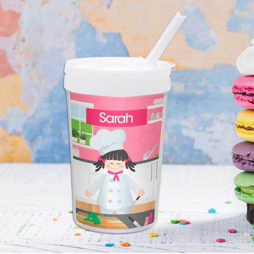 Spark & Spark A Girl Chef's Taste Toddler Cup, pink and white cup with a girl chef illustration and name 'Sarah' on it