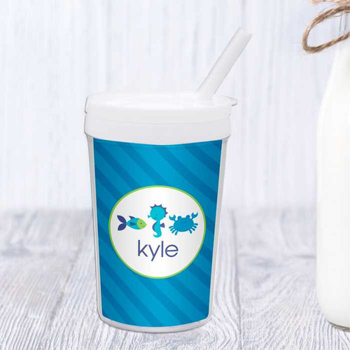 Spark & Spark Cute Undersea Creatures Toddler Cup, blue cup with undersea animal illustrations and personalized name 'Kyle' featured on it.