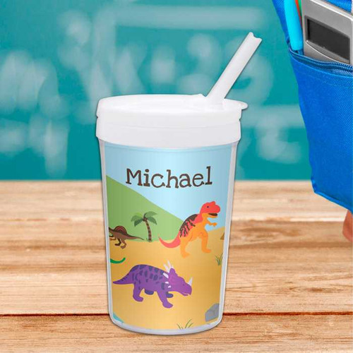 Spark & Spark Dinosaurs In The Jungle Toddler Cup, personalized with the name Michael, featuring colorful dinosaur illustrations and a straw.