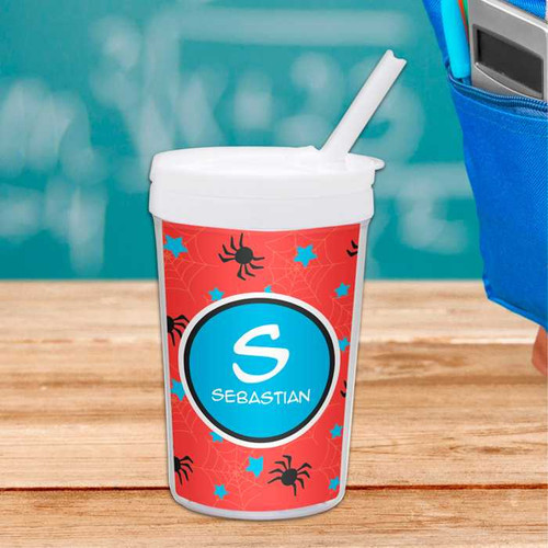Spark & Spark Fun Spider Web Toddler Cup, a red cup decorated with spider and web patterns, featuring a white lid and straw, personalized with the name Sebastian.