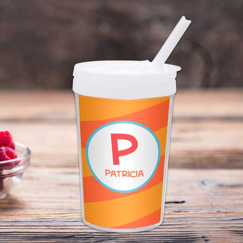 Spark & Spark Fun Initials Orange Toddler Cup, personalized orange and white cup with initial and name 'Patricia' for toddlers.
