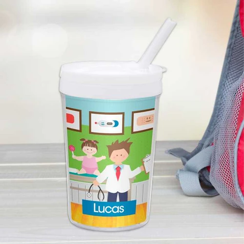 Spark & Spark Boy Doctor's Visit Toddler Cup, personalized with the name Lucas, featuring a colorful design of a boy doctor and a girl patient with medical-themed illustrations.