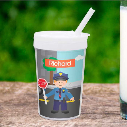 Spark & Spark Police on Duty Toddler Cup, kids' themed cup with a cartoon police officer holding a stop sign on a city street background.