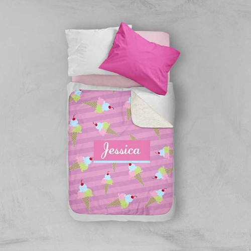 Spark & Spark An Ice Cream Pattern Sherpa Blanket, pink blanket with ice cream cone design and personalized name Jessica on it.
