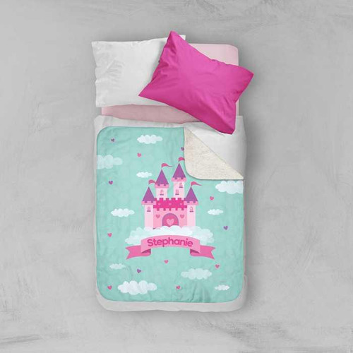 Spark & Spark A Castle in the Sky Sherpa Blanket, a colorful children's blanket featuring a pink castle with a banner with the name Stephanie, surrounded by clouds and hearts.