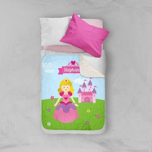 Spark & Spark Sweet Little Princess Sherpa Blanket with Princess and castle design, personalized with name Stephan, on a child's bed with pillows.