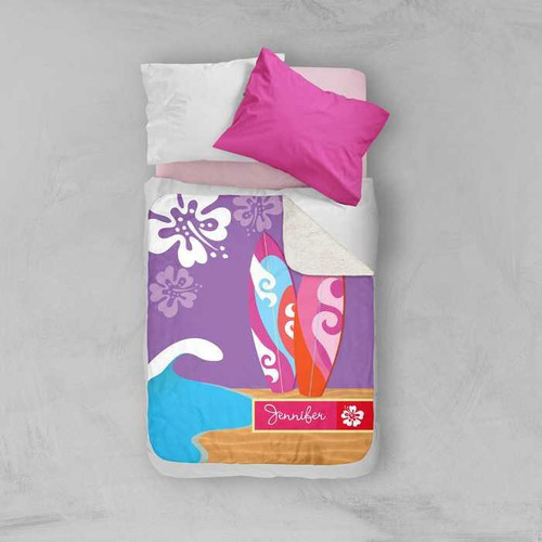 Spark & Spark Surfing The Waves Sherpa Blanket, colorful surfboard and wave design with floral accents and personalized name 'Jennifer' on the blanket.