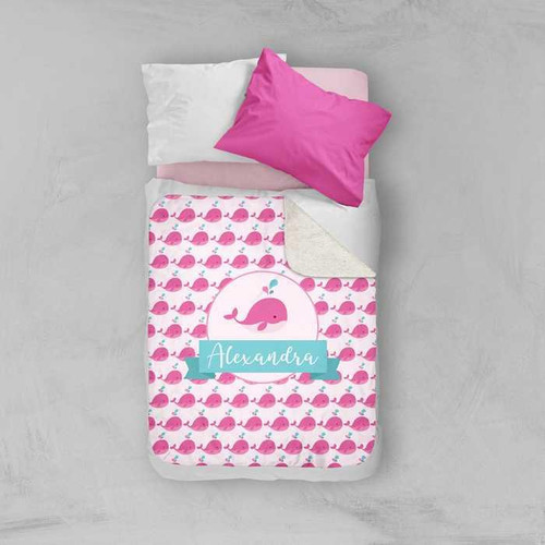 Spark & Spark Sweet Pink Whale Sherpa Blanket, pink whale pattern with customizable name Alexandra printed on it.