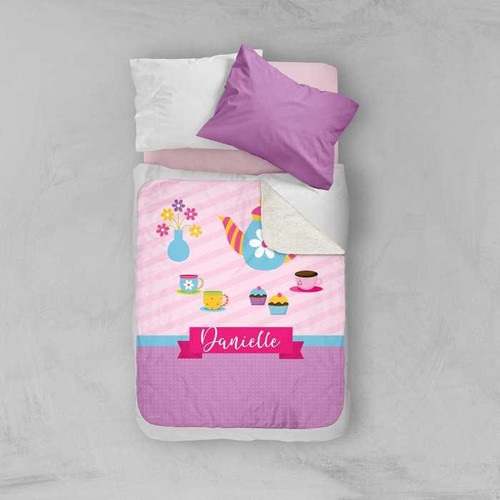 Spark & Spark Tea Time Sherpa Blanket, pink children's blanket with a colorful teapot, cups, cupcakes, and a personalized name label.