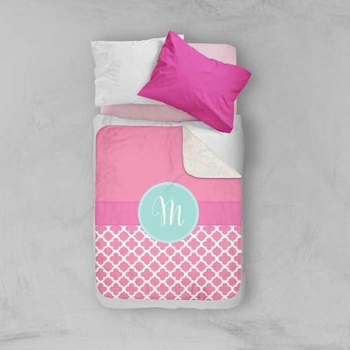 Spark & Spark Pretty Pink Quatrefoil Sherpa Blanket, pink and white geometric patterned plush sherpa blanket with a personalized monogrammed circle in the center.