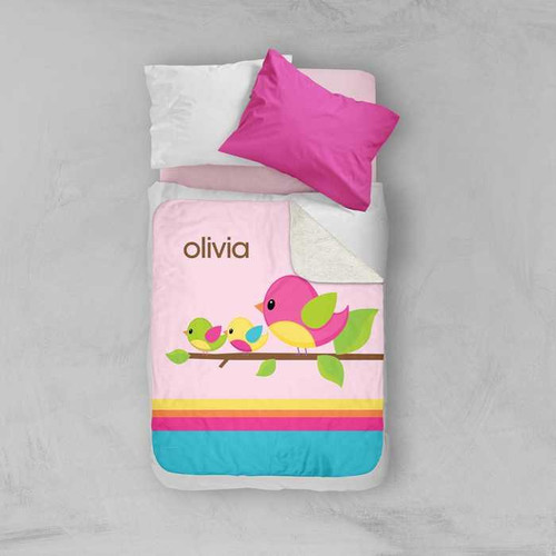 Spark & Spark Singing Birds Sherpa Blanket, personalized pink children's sherpa blanket with colorful bird design and name 'Olivia'.