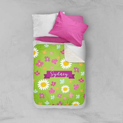 Spark & Spark Field Of Flowers Green Sherpa Blanket, personalized with the name Sydney and decorated with colorful flowers and butterflies.