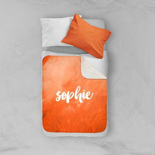 Spark & Spark Bold Colorful Name Orange Sherpa Blanket, personalized with the name 'Sophie' in white on an orange background with a sherpa texture.