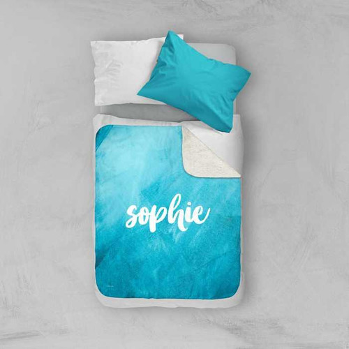 Spark & Spark Bold Colorful Name Aqua Sherpa Blanket, personalized with the name 'Sophie' in white on a vibrant aqua blue background.