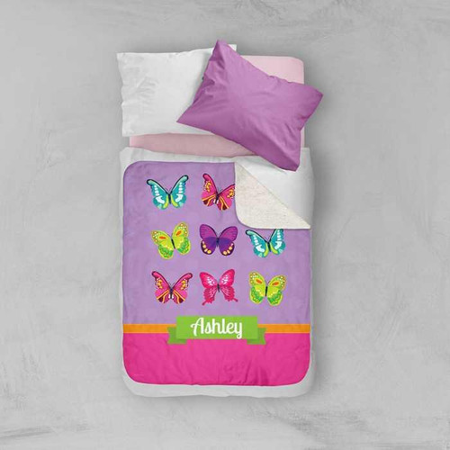 Spark & Spark Bright Butterflies Sherpa Blanket, personalized purple and pink butterfly design with name Ashley on the blanket.
