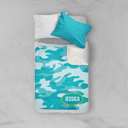 Spark & Spark Aqua & Yellow Camouflage Sherpa Blanket, a blue camouflage patterned blanket with a cozy sherpa underside and personalized with the name Jessica.