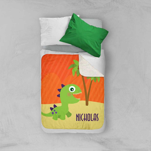 Spark & Spark Baby Dinosaur Sherpa Blanket, colorful green dinosaur design with a palm tree on an orange background with the name Nicholas, perfect for baby nursery decor.
