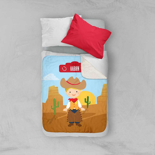 Spark & Spark Cowboy Sherpa Blanket, colorful children's bed blanket with cartoon cowboy and desert landscape design.