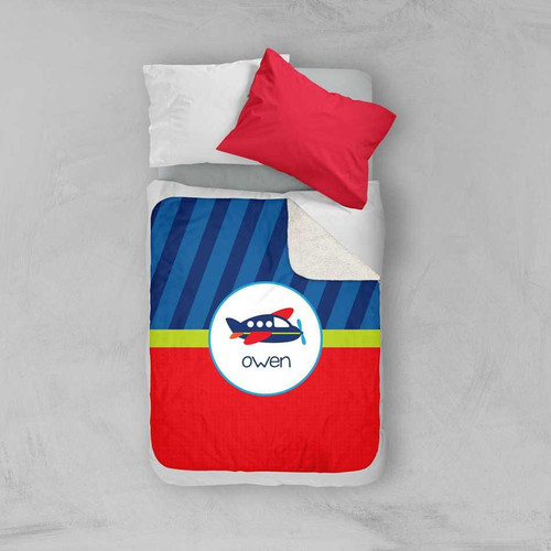 Spark & Spark Airplane Ride Sherpa Blanket, children's duvet with airplane design and personalized name 'Owen' on the front.