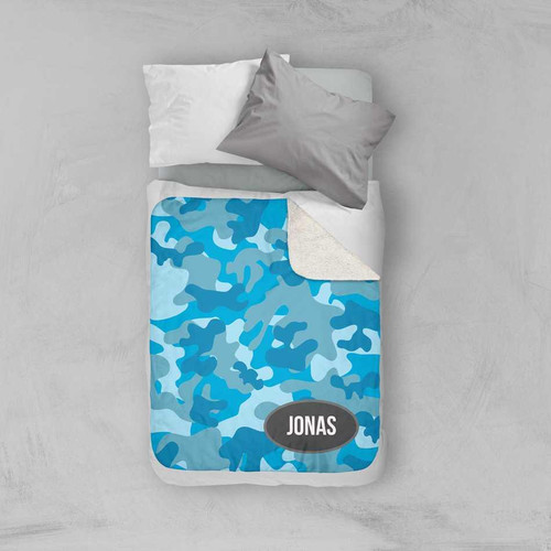 Spark & Spark Blue Camouflage Sherpa Blanket, front view showing blue camouflage pattern with personalized name 'JONAS' on the blanket.