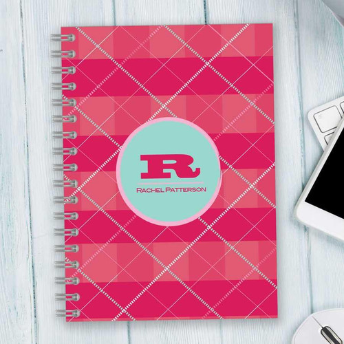 SparkGreetings® Criss Cross Writing Journal, pink and red plaid pattern with personalized monogram and name on cover.