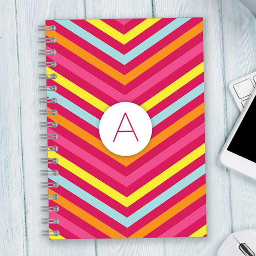 SparkGreetings® Style in Stripes Writing Journal, colorful striped design with a monogrammed letter 'A' on the cover.