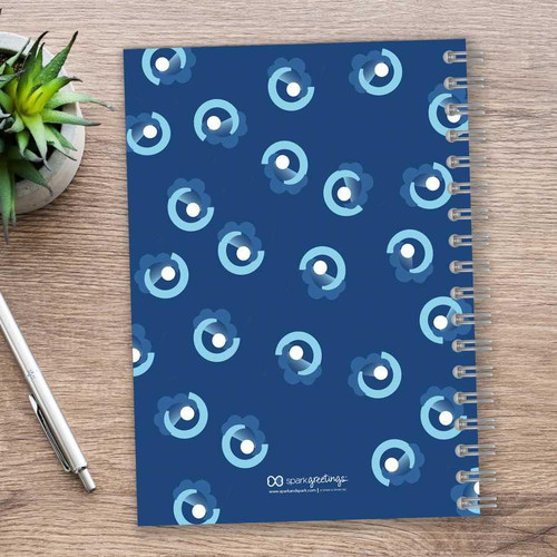 SparkGreetings® Small Swirls Writing Journal, blue cover with small swirl pattern design.