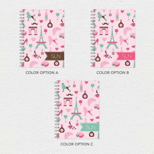 SparkGreetings® Paris Chic Style Writing Journal, with a pink background and illustration of Parisian elements and accessories in pastel colors.