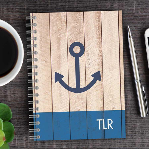 SparkGreetings® Rustic Anchor Writing Journal, wooden cover design with a navy blue anchor graphic and 'TLR' text on the bottom right corner.