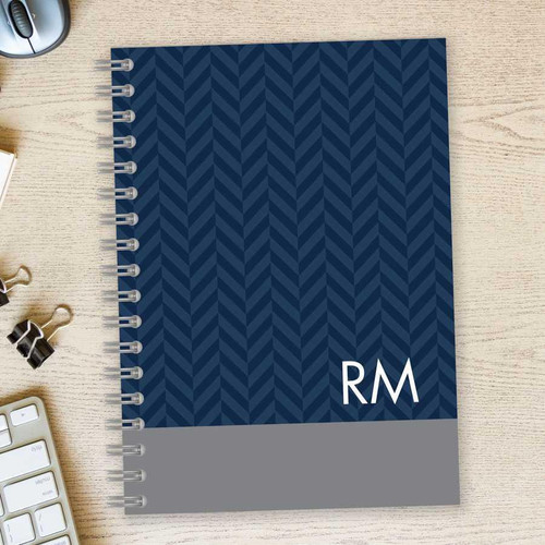 SparkGreetings® Herringbone Mood Writing Journal, blue cover with a herringbone pattern and customizable initials 'RM' at the bottom right corner.