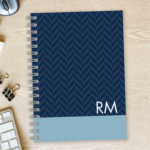 SparkGreetings® Herringbone Mood Writing Journal, navy blue cover with a herringbone pattern and initials 'RM' on the front.