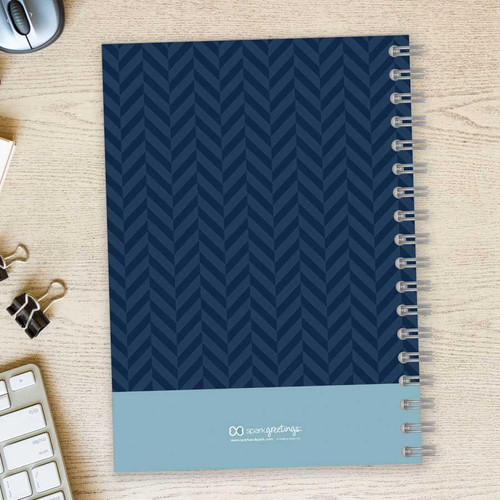 SparkGreetings® Herringbone Mood Writing Journal, navy blue cover with herringbone pattern and light blue bottom section with logo.