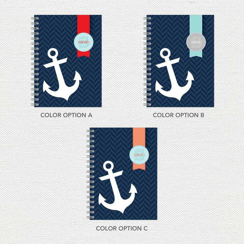 SparkGreetings® Small Anchor Writing Journal, navy blue cover with white anchor graphic and colorful ribbon accents in red, light blue, and coral, customizable with name 'Sarah' in a circular label.